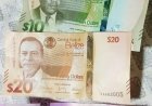 NIEUWE BELIZAANSE VALUTA MORGEN BIJ GELDAUTOMATEN IN HET HELE LAND