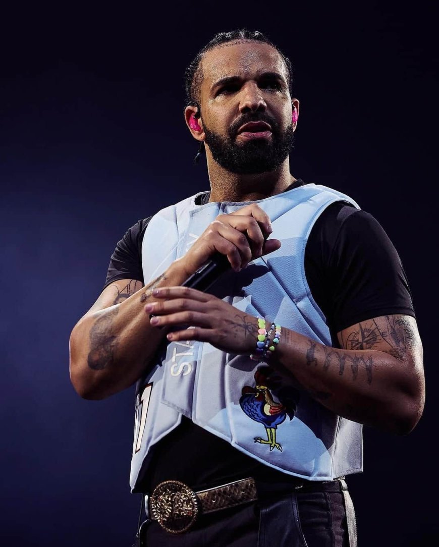 Drake ontvangt gesigneerd George “The Iceman” Gervin-tricot