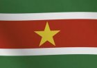 Vijftig jaar Suriname, vijfpuntige ster in vlag, vijf letters NATIO