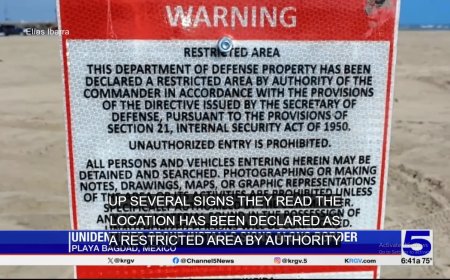 Waarschuwingsborden op Mexicaans strand verklaren gebied door VS verboden