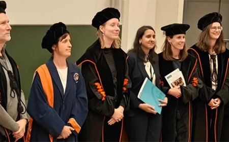 AdeKUS-docent promoveert in België