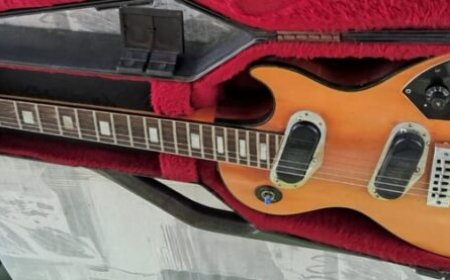 Familie schenkt iconische gitaar Henry Menes aan Kaseko Museum