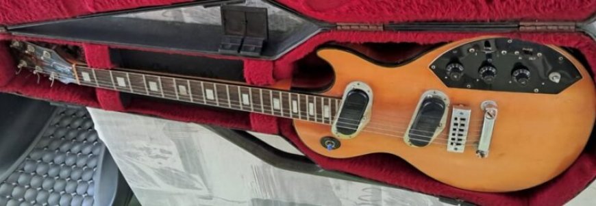 Familie schenkt iconische gitaar Henry Menes aan Kaseko Museum