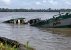 Boot met lading zinkt op Corantijnrivier bij Apoera, bemanning ontsnapt aan verdrinkingsdood
